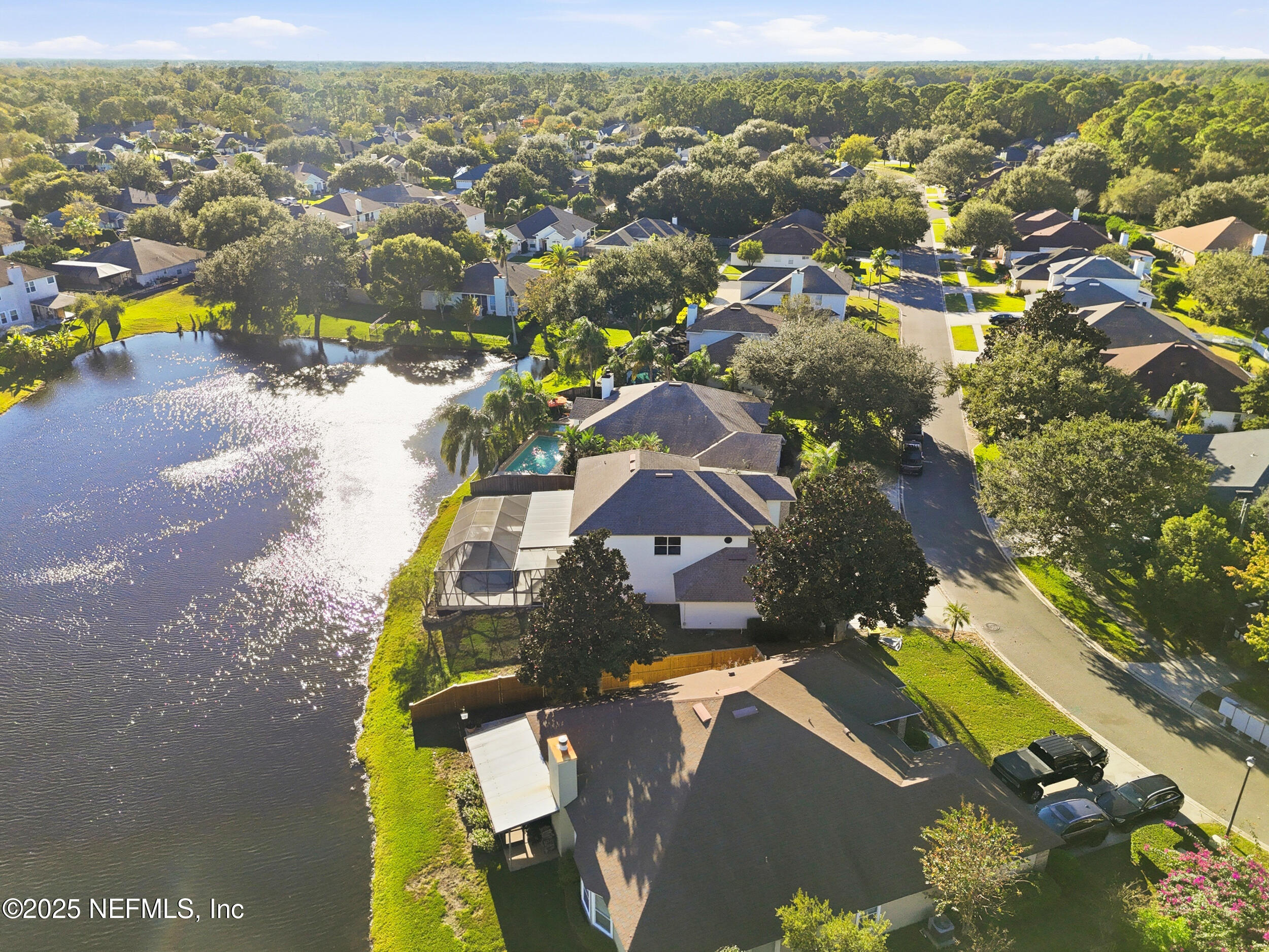 13962 Ibis Point Boulevard Jacksonville, FL 32224 - Photo 55 of 63 an aerial view of residential houses with outdoor space