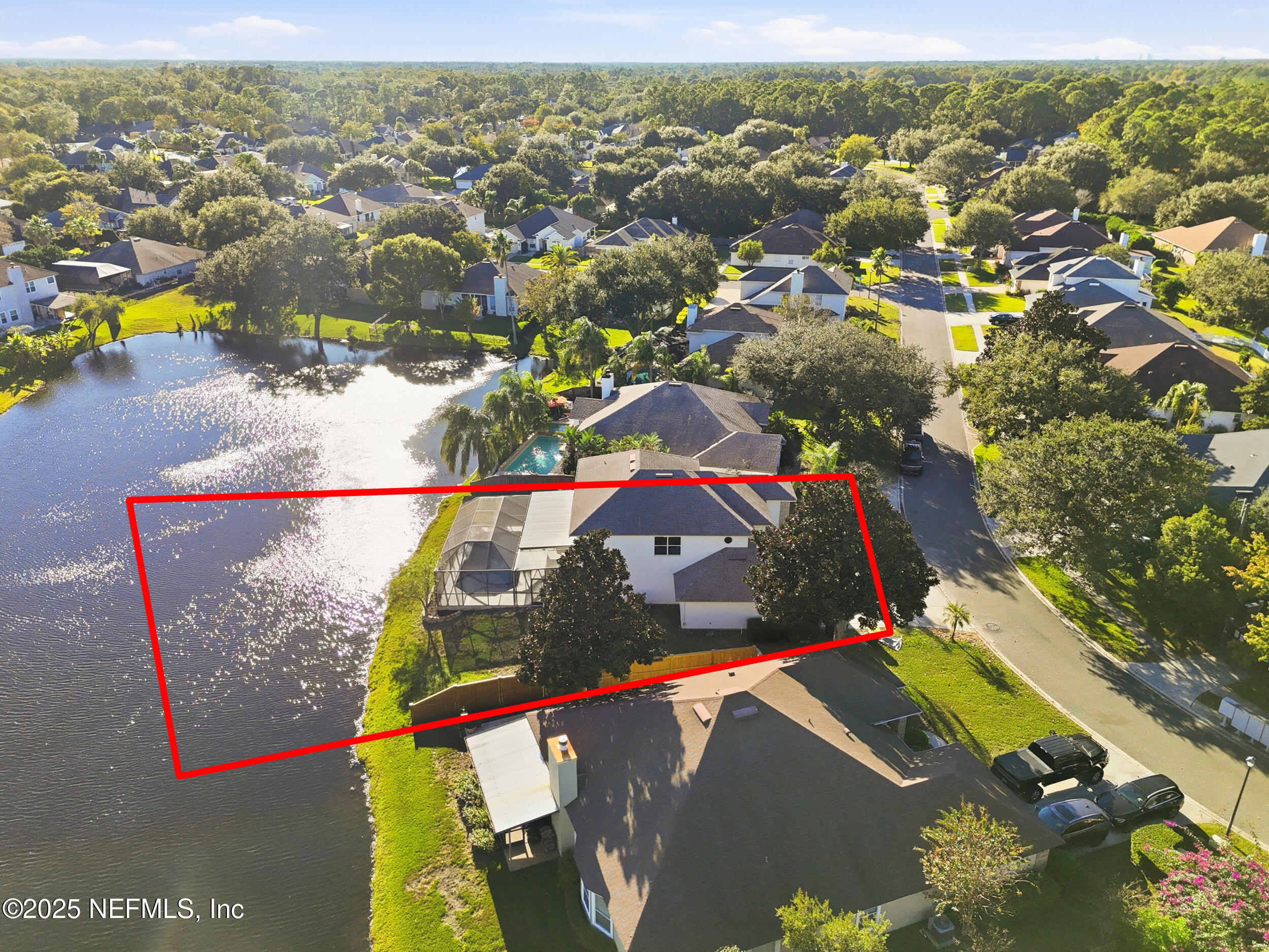 13962 Ibis Point Boulevard Jacksonville, FL 32224 - Photo 56 of 63 an aerial view of residential houses with outdoor space