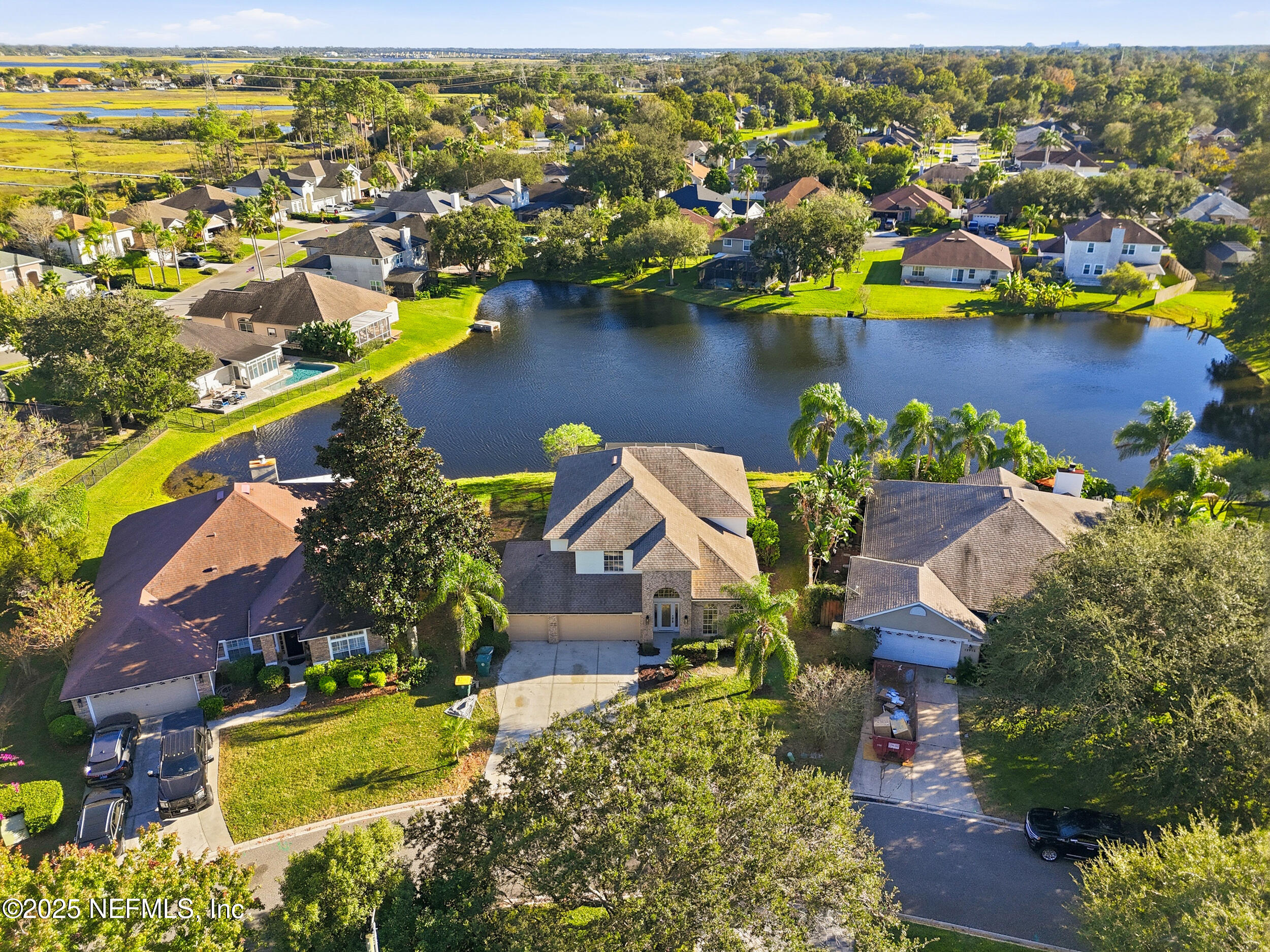 13962 Ibis Point Boulevard Jacksonville, FL 32224 - Photo 62 of 63 an aerial view of residential houses with outdoor space