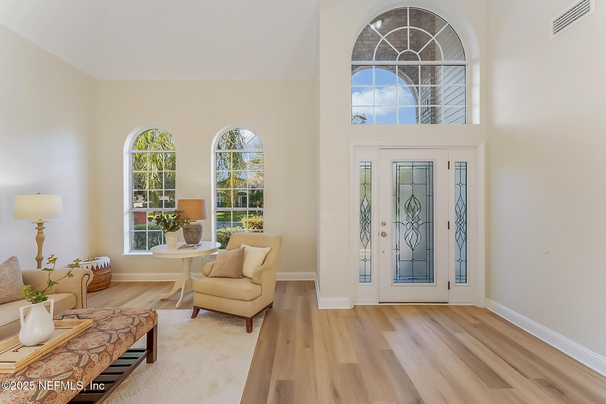 13962 Ibis Point Boulevard Jacksonville, FL 32224 - Photo 9 of 63 a living room with furniture and a window