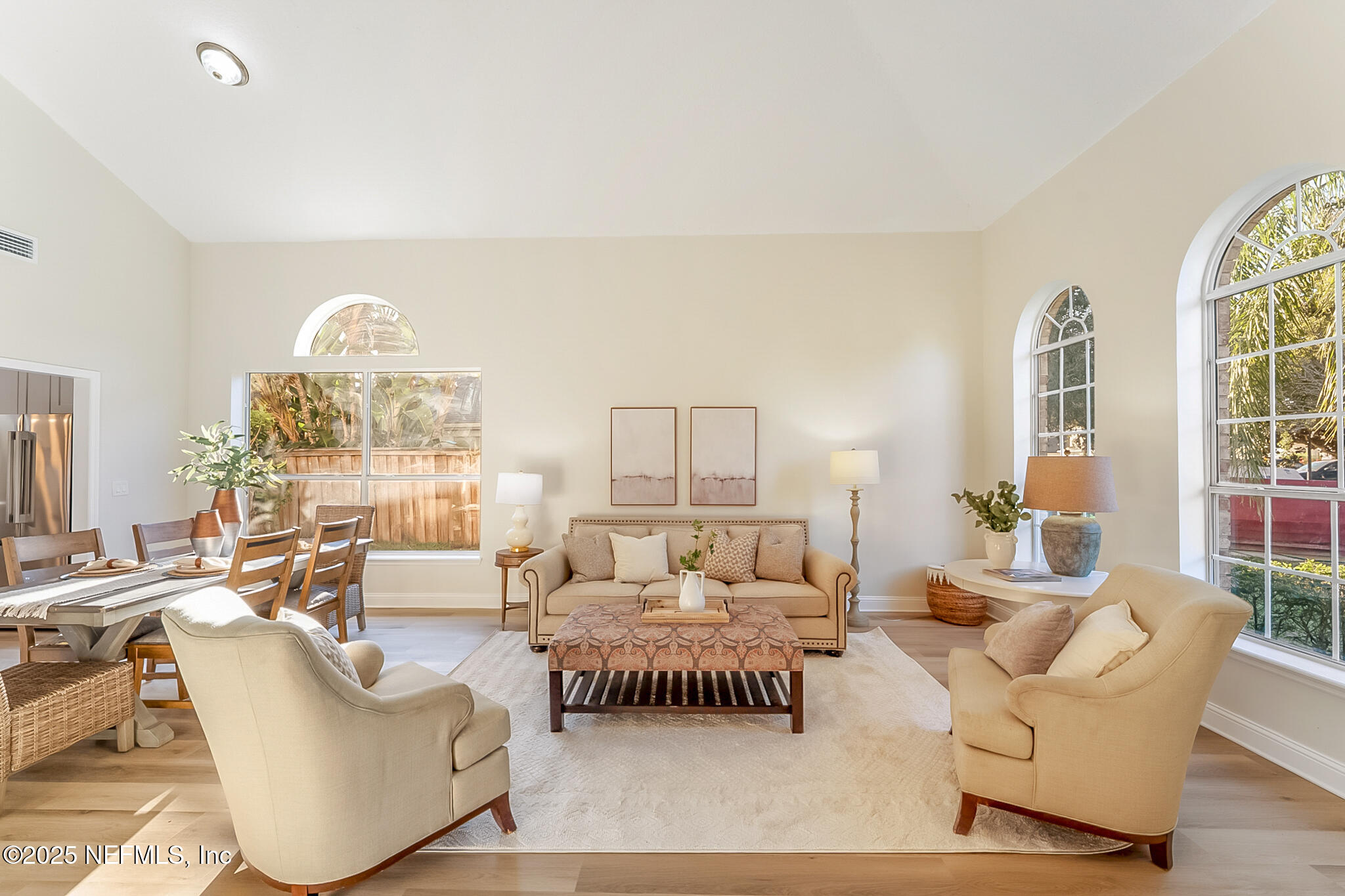 13962 Ibis Point Boulevard Jacksonville, FL 32224 - Photo 10 of 63 a living room with furniture and a large window