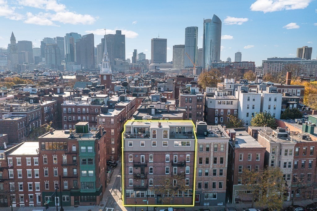 480 Commercial Street, Unit 5B Boston, MA 02109 - Photo 18 of 21 a city view with tall buildings