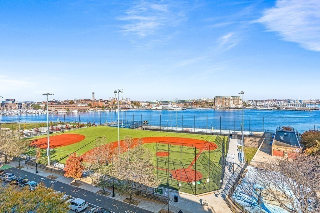 480 Commercial Street, Unit 5B Boston, MA 02109 - Photo 3 of 21 a view of a swimming pool with a lounge chair