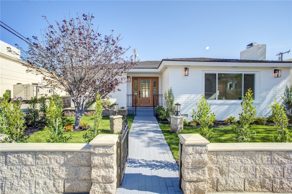 150 Siena Drive Long Beach, CA 90803 - Photo 3 of 40 a front view of a house with garden