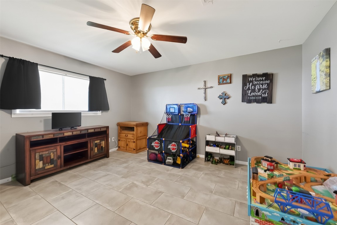 2555 Straznicky Road Beasley, TX 77417 - Photo 18 of 25 Bonus room conceniently located right off the livingroom with endless possibilities.