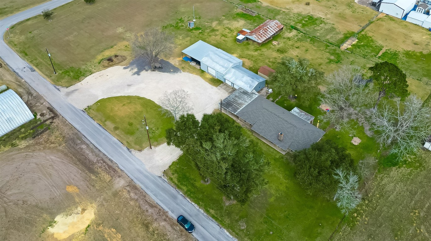 2555 Straznicky Road Beasley, TX 77417 - Photo 25 of 25 Unrestricted acreage offering endless possibilities, ideal for home business, storage, equipment parking, or workshop space.