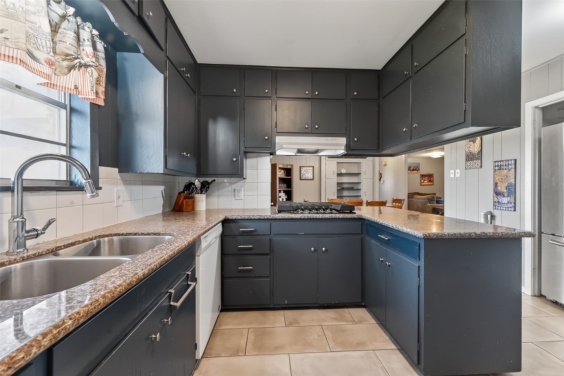 2555 Straznicky Road Beasley, TX 77417 - Photo 7 of 25 Open kitchen layout with a practical layout with generous cabinet storage and workspace.