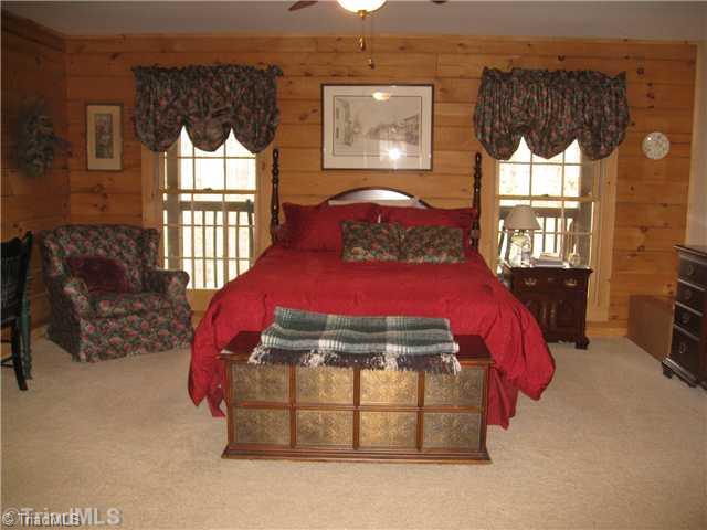 6715 Ventwood Road Climax, NC 27233 - Photo 16 of 16 Master Bedroom. Floor plan offers a main level master suite with private bath + an additional bedroom with full bath on the main as well. 3rd bedroom + full bath located upstairs.