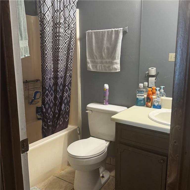 1608 Enchanted Forest Drive Conley, GA 30288 - Photo 13 of 22 a bathroom with a sink toilet and shower