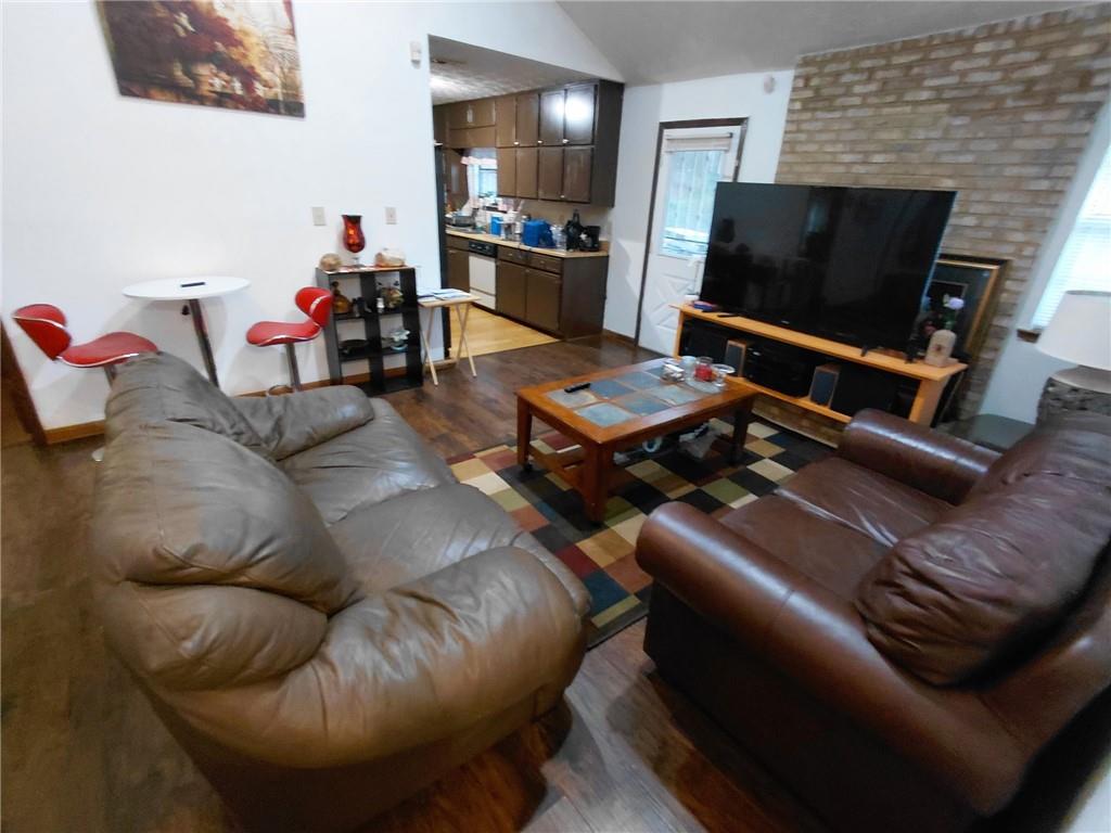 1608 Enchanted Forest Drive Conley, GA 30288 - Photo 20 of 22 a living room with furniture and a flat screen tv