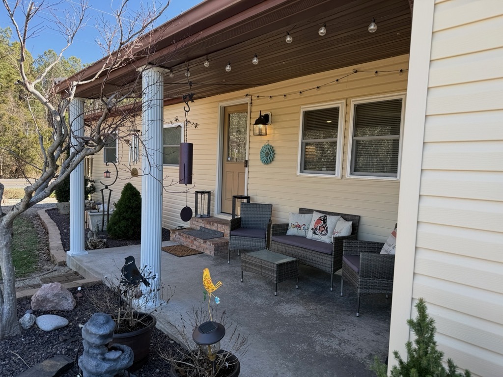 10915 Union Ridge Lane Marion, IL 62959 - Photo 3 of 12 a backyard of a house with outdoor seating