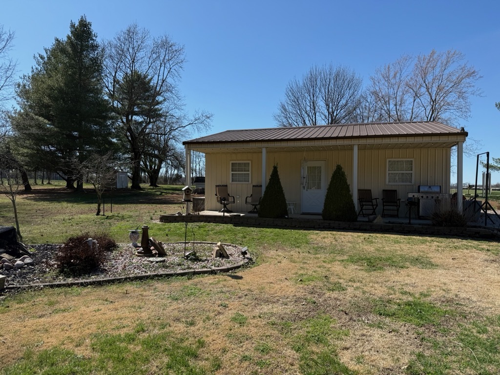 10915 Union Ridge Lane Marion, IL 62959 - Photo 5 of 12 a front view of a house with garden