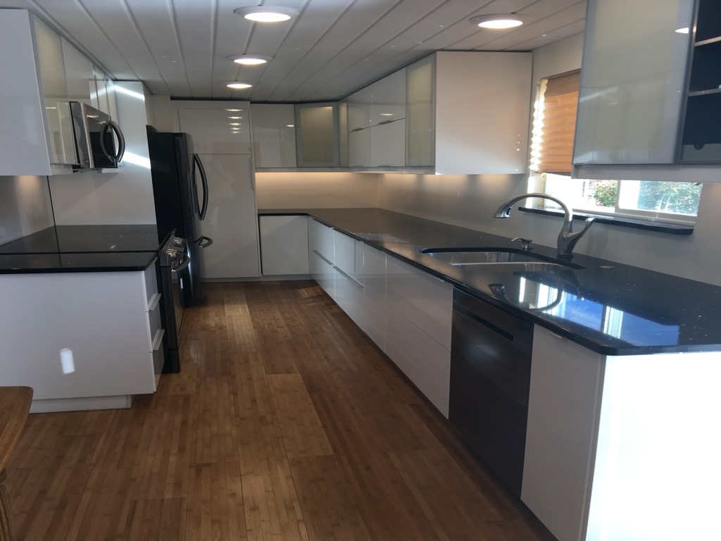 10915 Union Ridge Lane Marion, IL 62959 - Photo 8 of 12 a kitchen with stainless steel appliances granite countertop a sink a stove and a wooden floors