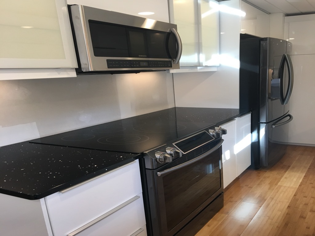 10915 Union Ridge Lane Marion, IL 62959 - Photo 10 of 12 a close view of kitchen stove top oven and refrigerator