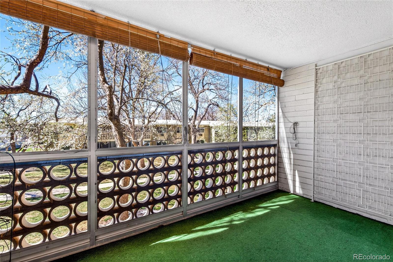 720 South Clinton Street, Unit B1 Denver, CO 80247 - Photo 17 of 19 a front view of a garden