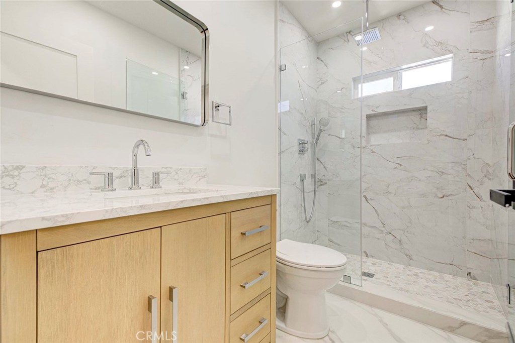 2238 North N Keystone Burbank, CA 91504 - Photo 12 of 21 a bathroom with a sink a toilet and shower