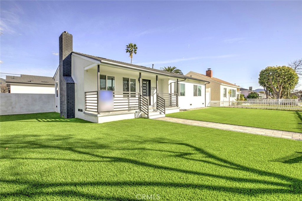 2238 North N Keystone Burbank, CA 91504 - Photo 19 of 21 a front view of a house with a garden