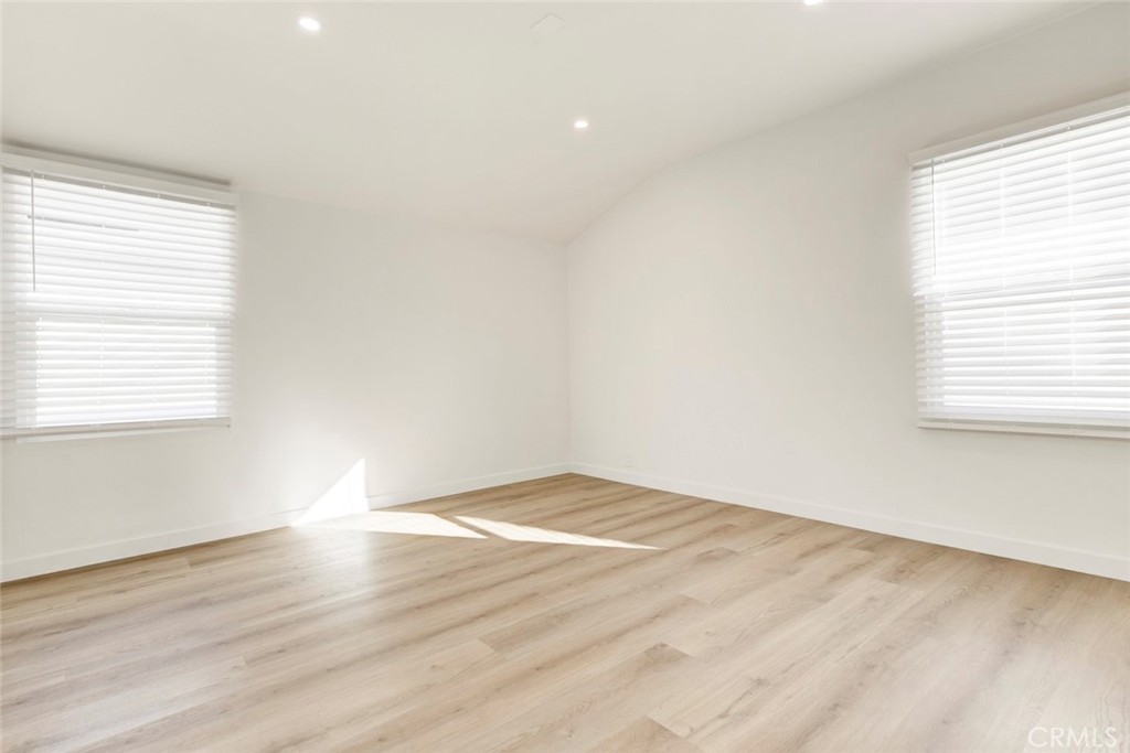 2238 North N Keystone Burbank, CA 91504 - Photo 10 of 21 an empty room with wooden floor and windows