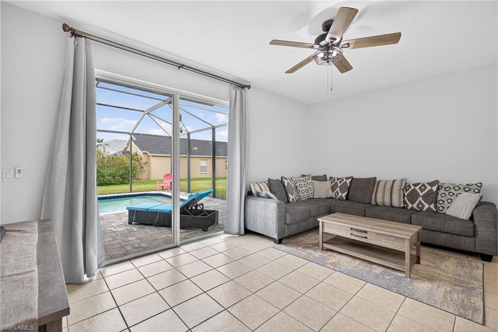 21560 Brixham Run Loop Estero, FL 33928 - Photo 11 of 43 Enjoy view of your pool from your living room!
