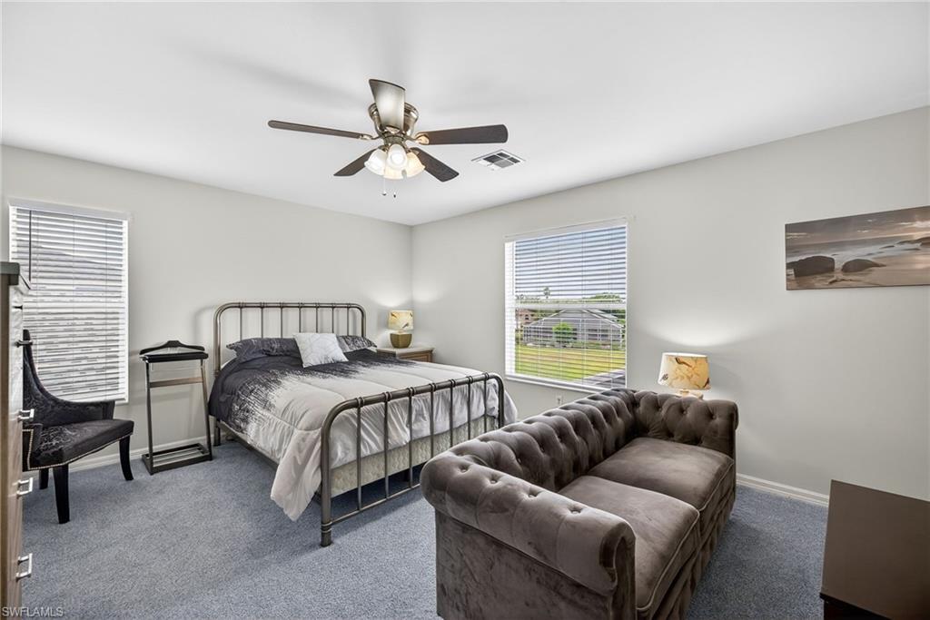 21560 Brixham Run Loop Estero, FL 33928 - Photo 18 of 43 The primary bedroom will be your retreat at a day's end.