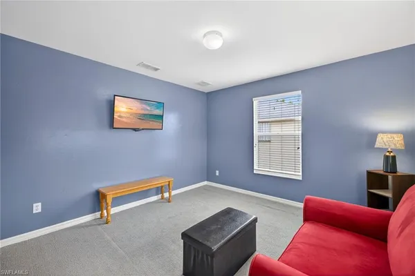 a view of a livingroom with an entryway
