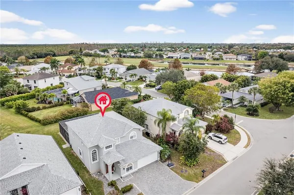an aerial view of a house with a outdoor space
