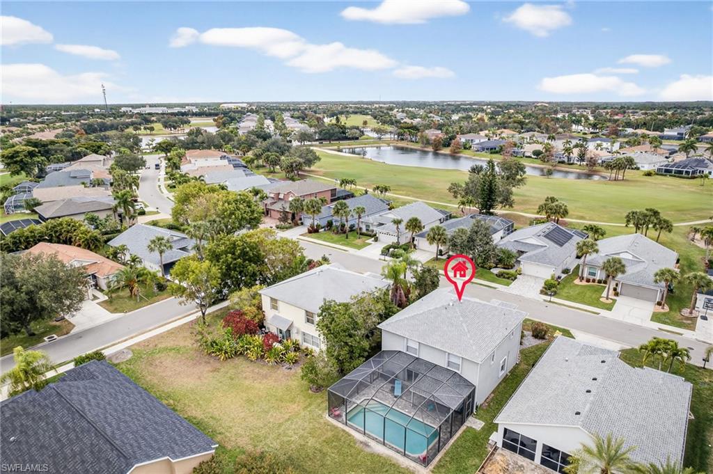 21560 Brixham Run Loop Estero, FL 33928 - Photo 37 of 43 Aerial view of the back of the home.