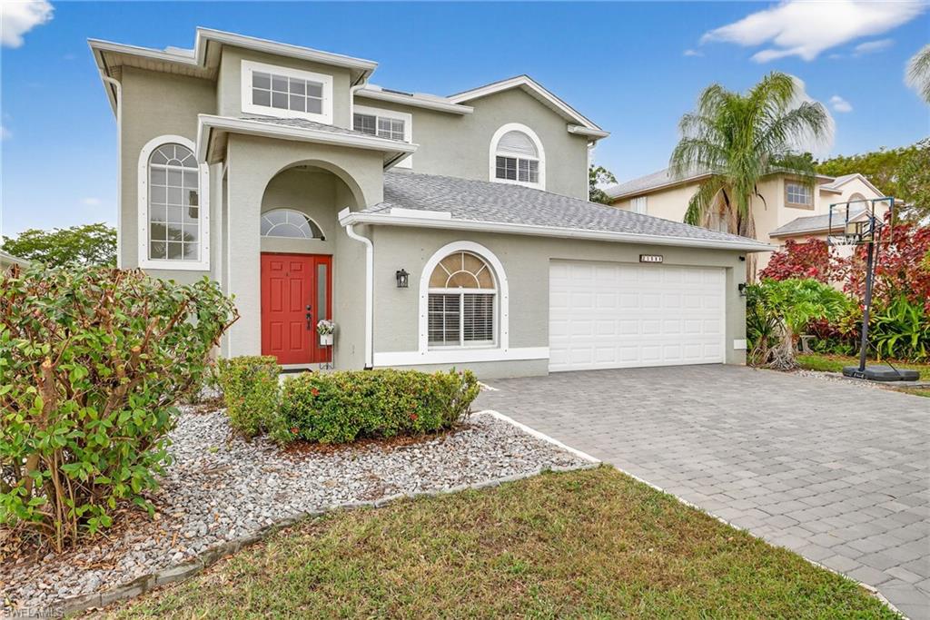 21560 Brixham Run Loop Estero, FL 33928 - Photo 4 of 43 Home features a 2-stall garage PLUS a 3-car wide driveway. Ample space for parking.