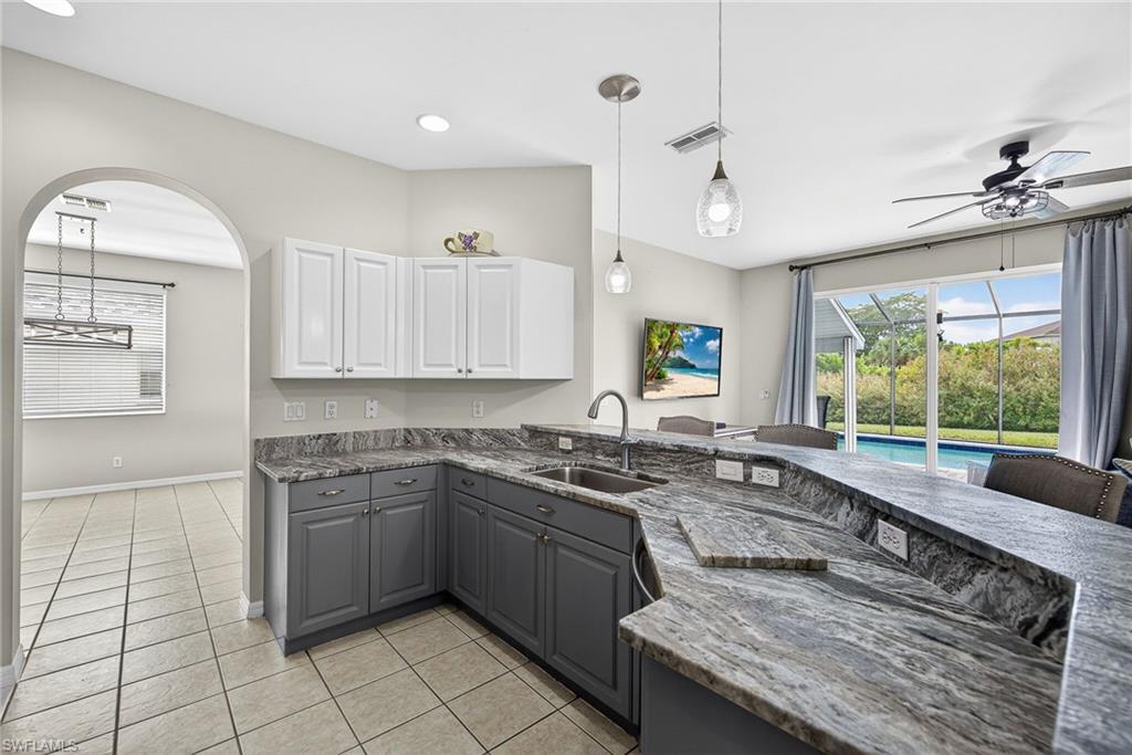 21560 Brixham Run Loop Estero, FL 33928 - Photo 5 of 43 This kitchen is PERFECT for entertaining!