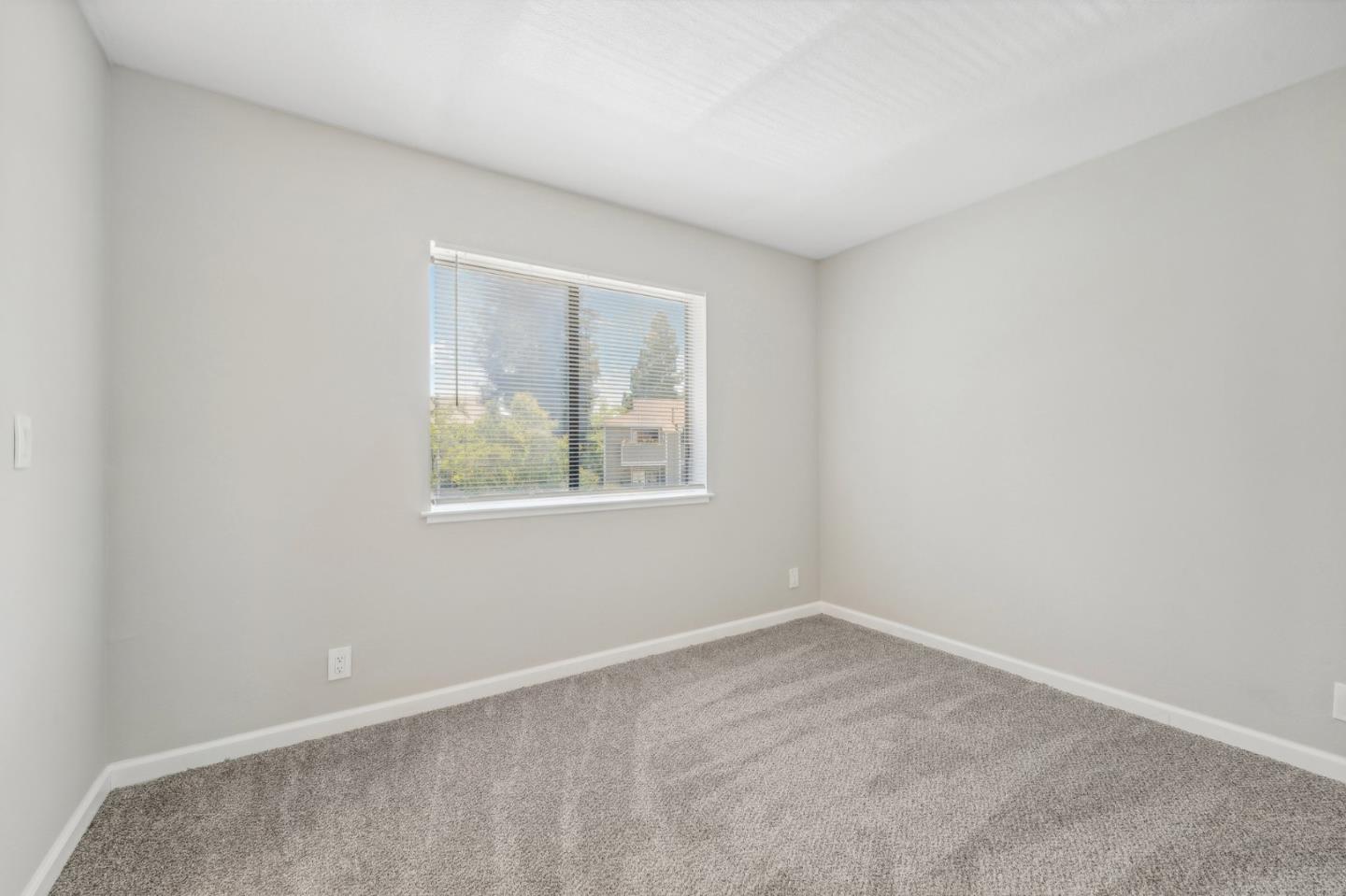 288 Stonegate Circle San Jose, CA 95110 - Photo 11 of 18 an empty room with a window