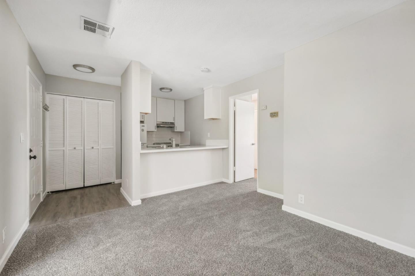 288 Stonegate Circle San Jose, CA 95110 - Photo 7 of 18 a view of a kitchen with refrigerator and window