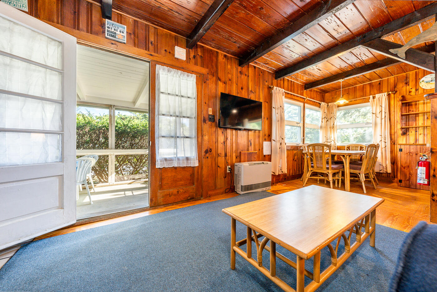 45 Ocean View Drive, Unit 7 Wellfleet, MA 02667 - Photo 6 of 32 a living room with pool table and windows