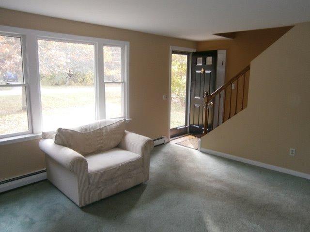 589 Skunknet Road Centerville, MA 02632 - Photo 3 of 15 a living room with furniture and a window