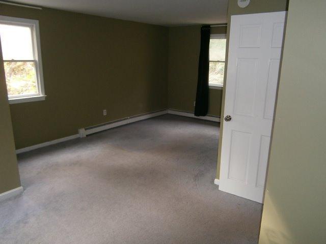 589 Skunknet Road Centerville, MA 02632 - Photo 10 of 15 an empty room with windows