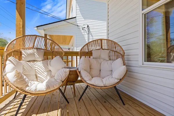 a view of entryway with wooden floor