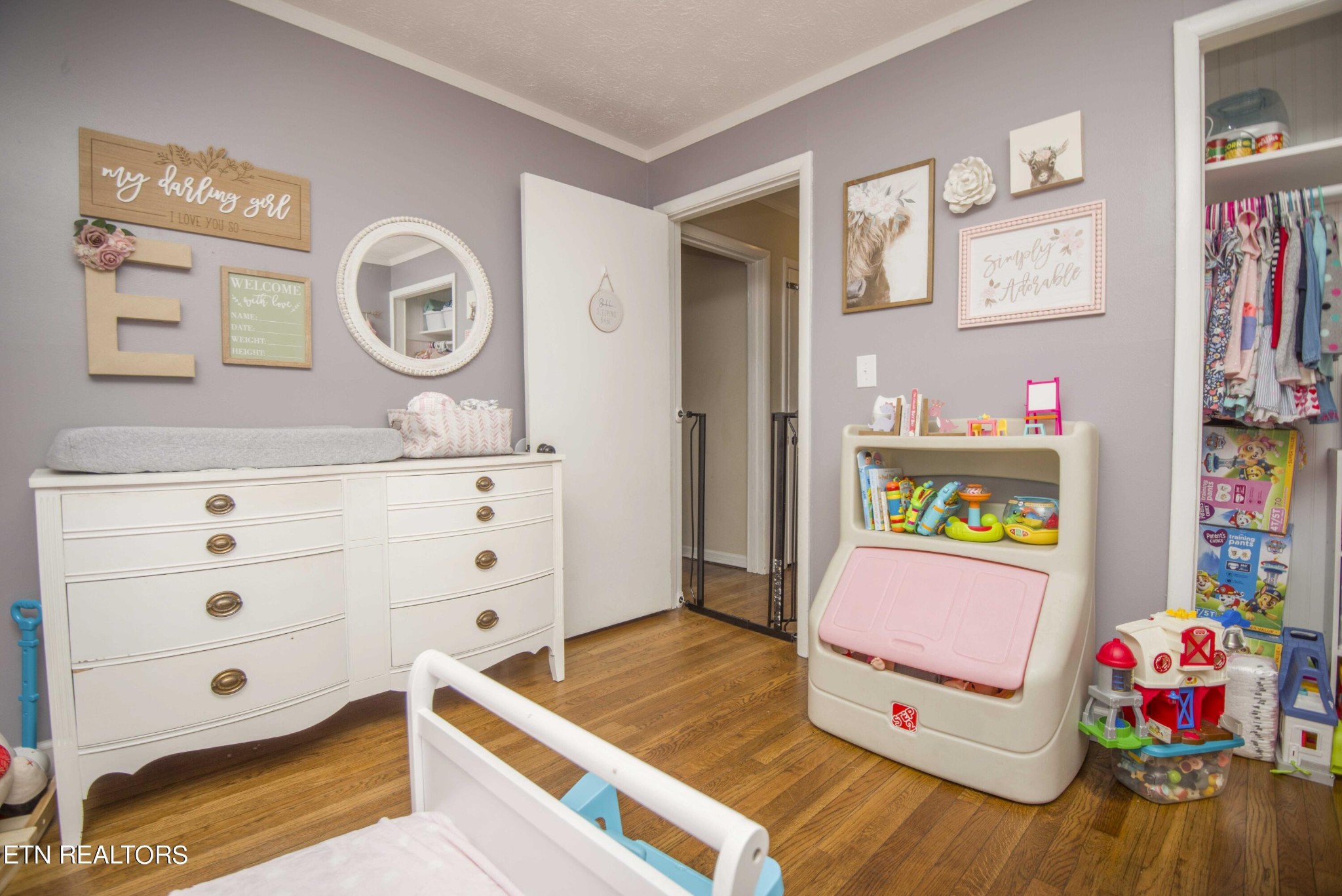 102 Briar Road Oak Ridge, TN 37830 - Photo 29 of 39 a bedroom with a bed and hallway