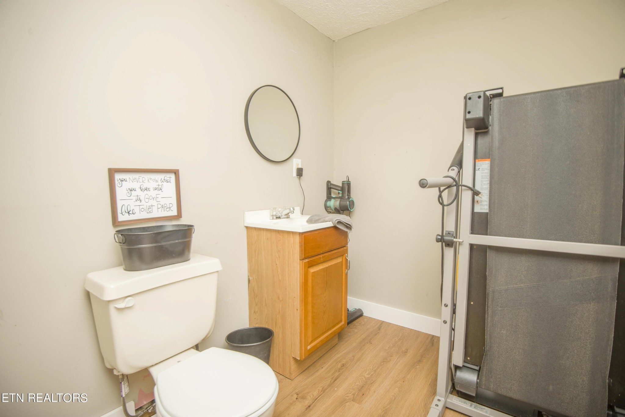 102 Briar Road Oak Ridge, TN 37830 - Photo 32 of 39 a white toilet sitting next to a bathroom sink