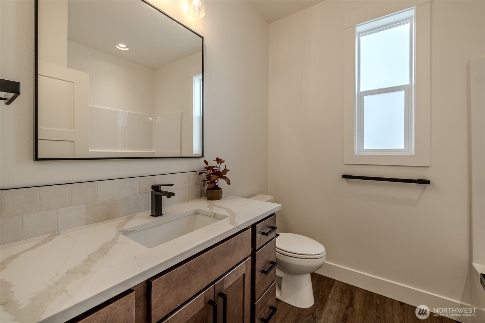 960 Wayne Lane Wenatchee, WA 98801 - Photo 13 of 22 a bathroom with a sink a toilet and mirror