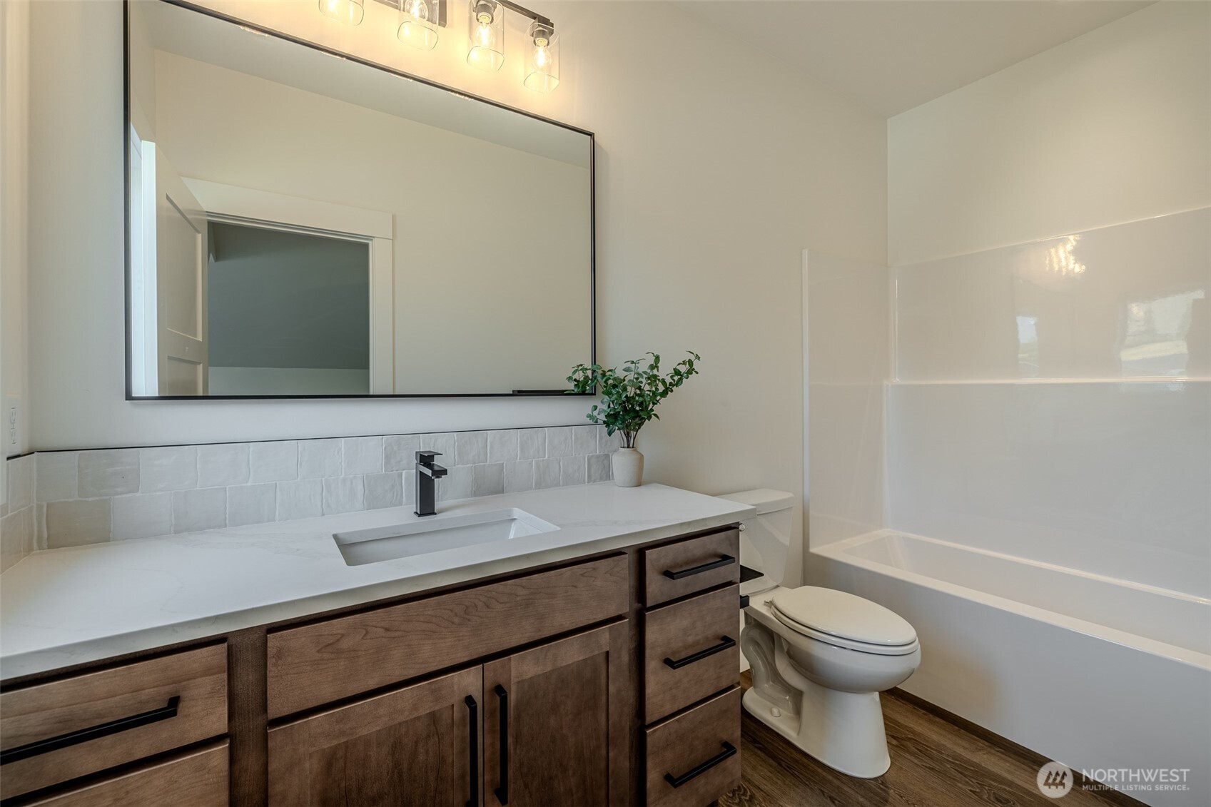 960 Wayne Lane Wenatchee, WA 98801 - Photo 18 of 22 a bathroom with a toilet sink and mirror