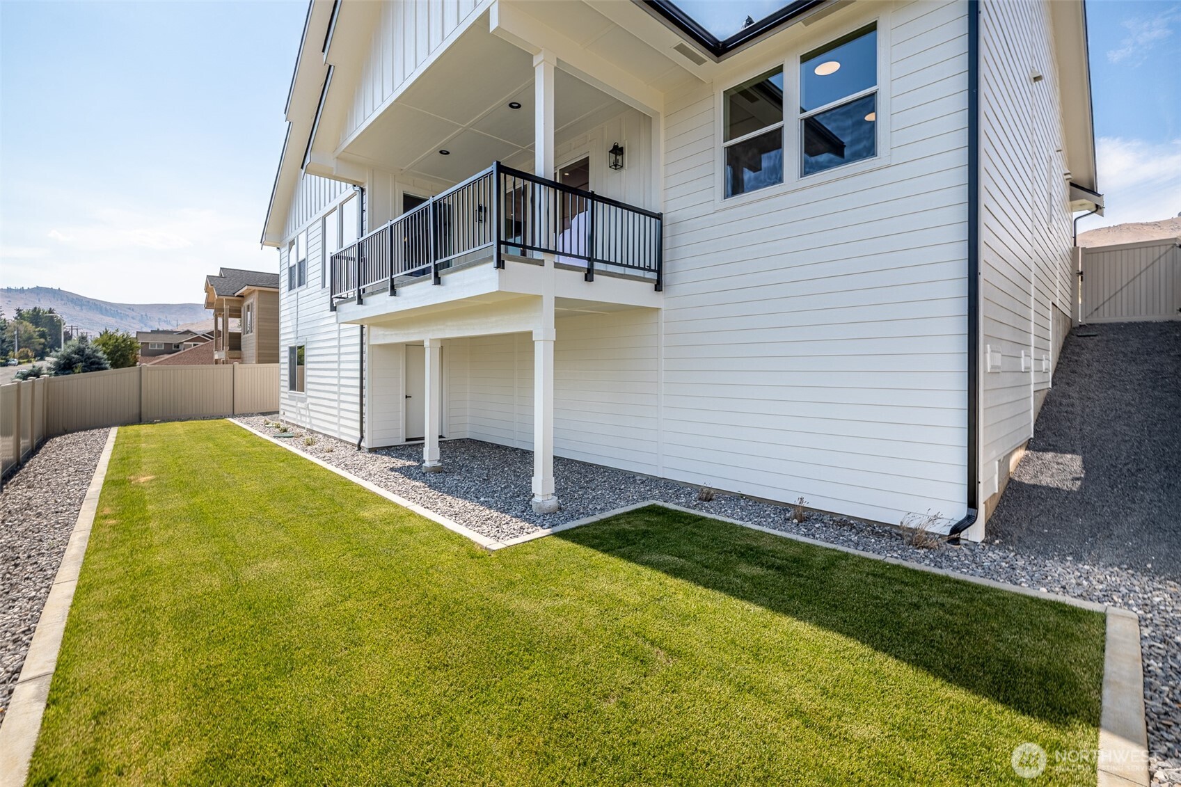960 Wayne Lane Wenatchee, WA 98801 - Photo 19 of 22 a front view of a house with a yard