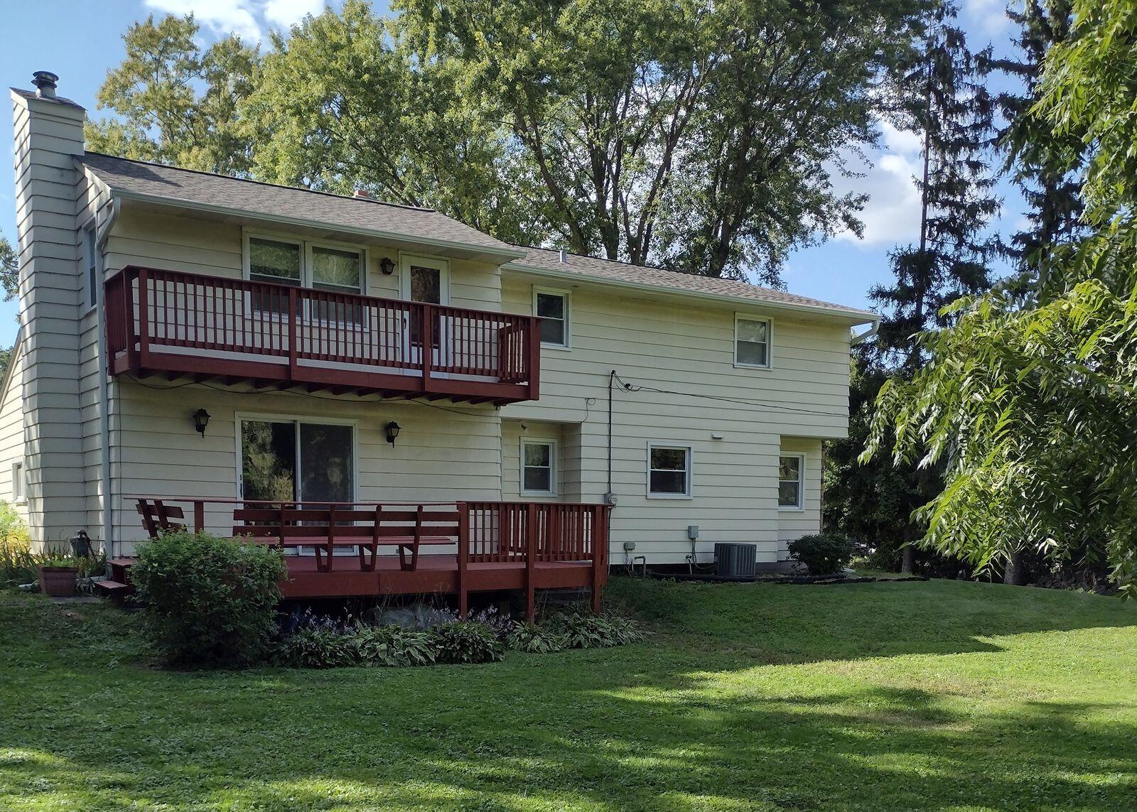 2324 South Brookland Road New Berlin, WI 53151 - Photo 41 of 56 Summer back view