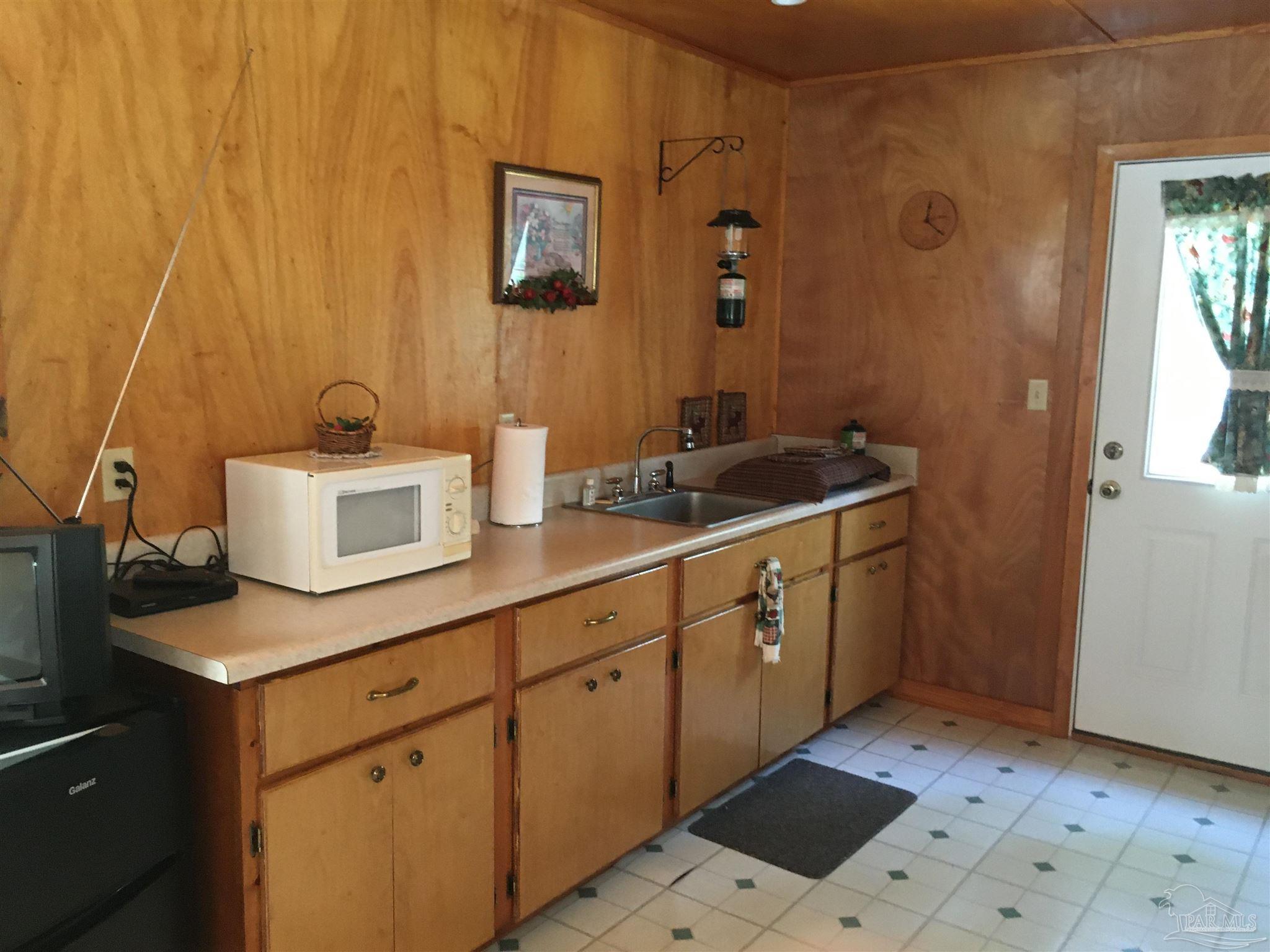 7007 Cassidy Road McDavid, FL 32568 - Photo 7 of 22 KITCHEN AREA