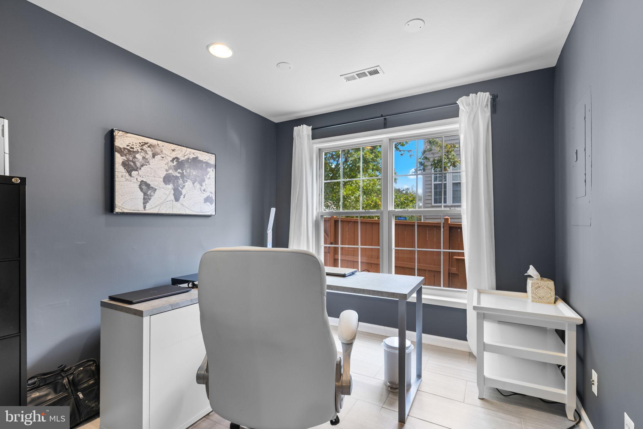 6311 Burgundy Leaf Lane Alexandria, VA 22312 - Photo 19 of 33 a workspace with furniture and a window