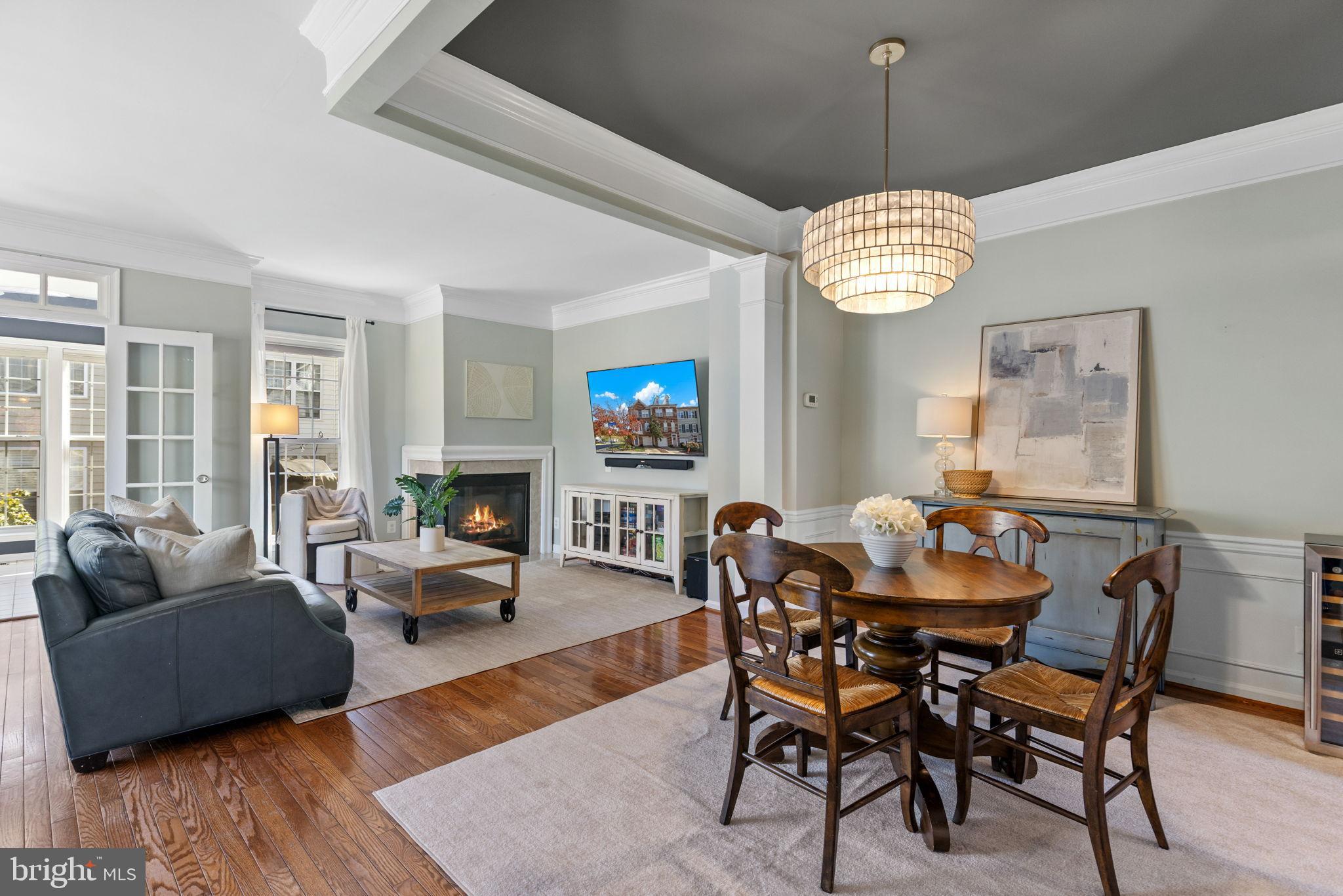 6311 Burgundy Leaf Lane Alexandria, VA 22312 - Photo 33 of 33 a view of a dining room with furniture wooden floor and chandelier
