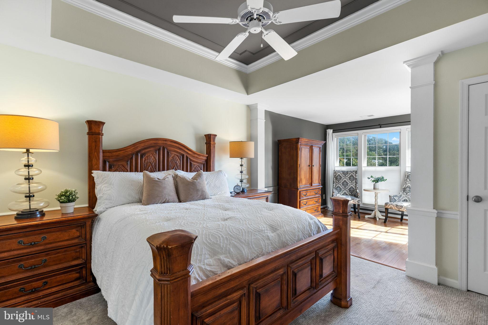 6311 Burgundy Leaf Lane Alexandria, VA 22312 - Photo 20 of 33 a bedroom with a bed and wooden floor