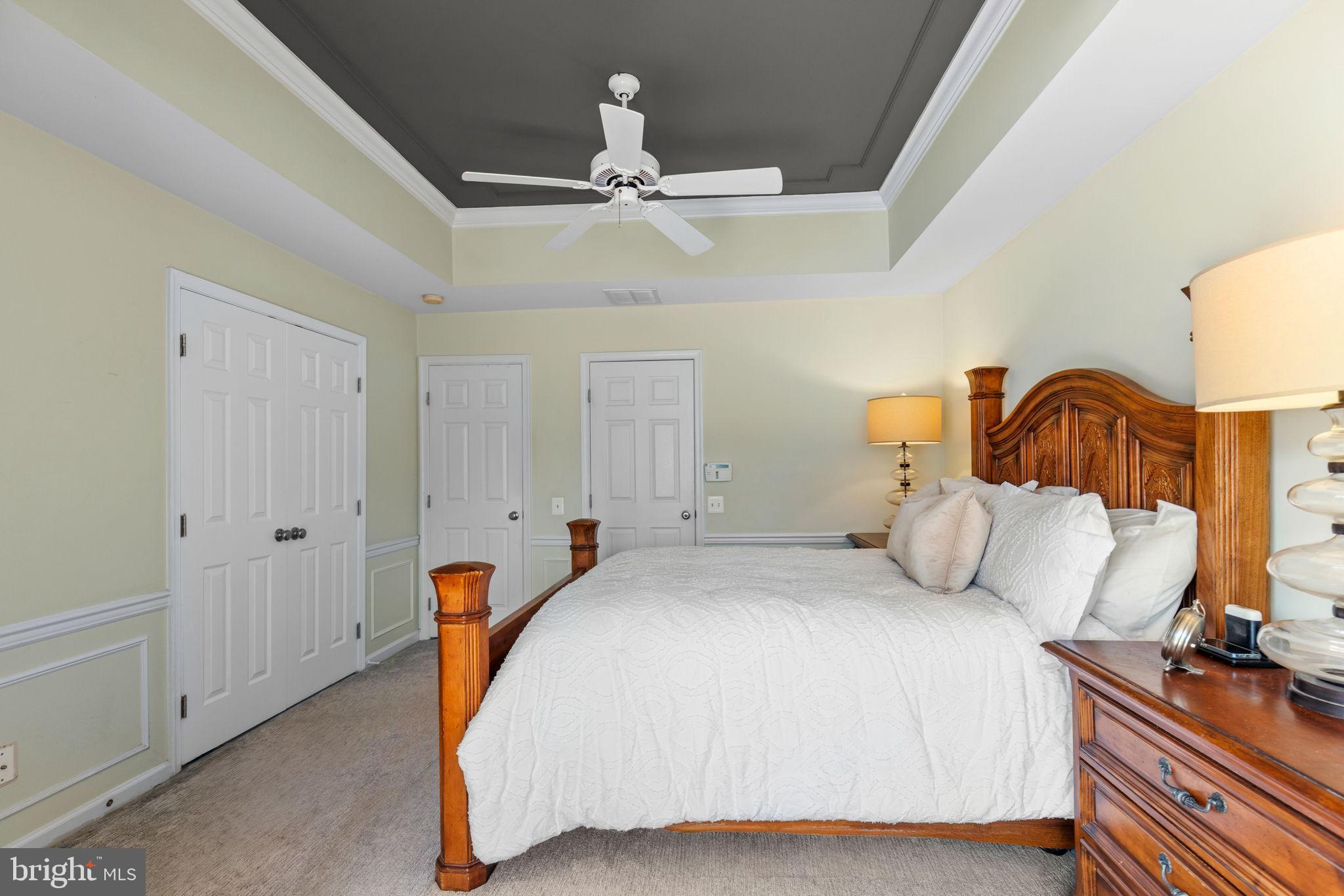 6311 Burgundy Leaf Lane Alexandria, VA 22312 - Photo 25 of 33 a bedroom with bed and wooden floor