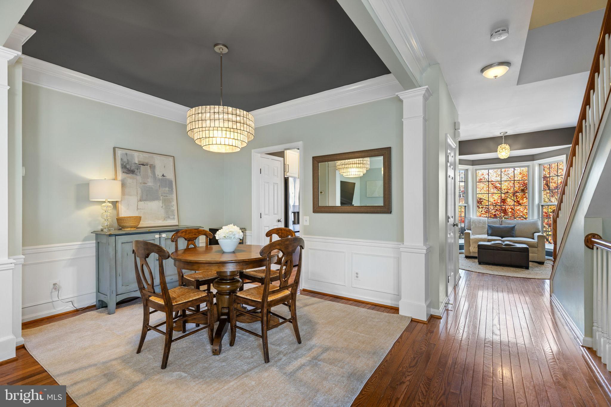 6311 Burgundy Leaf Lane Alexandria, VA 22312 - Photo 5 of 33 a view of a dining room with furniture and wooden floor
