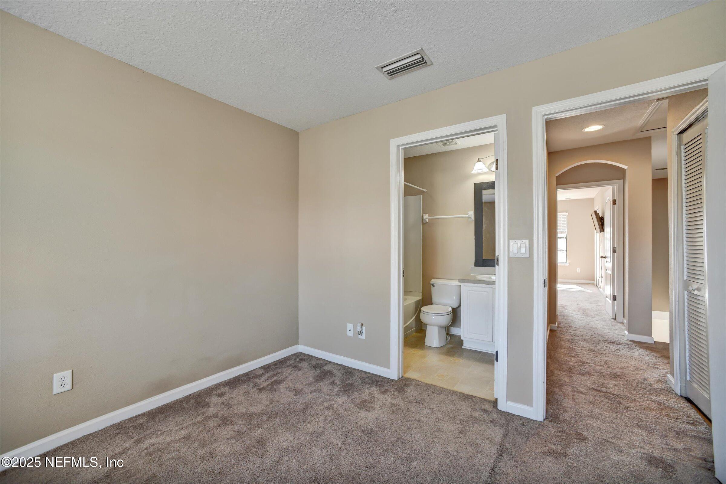 480 Cabernet Place St. Augustine, FL 32084 - Photo 25 of 37 a view of room with windows and bathroom view