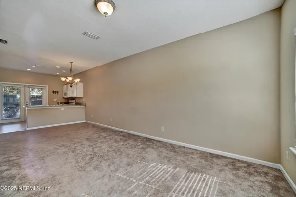 a view of a livingroom with a staircase
