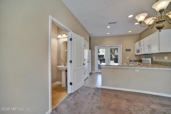 a view of a room that has a large window